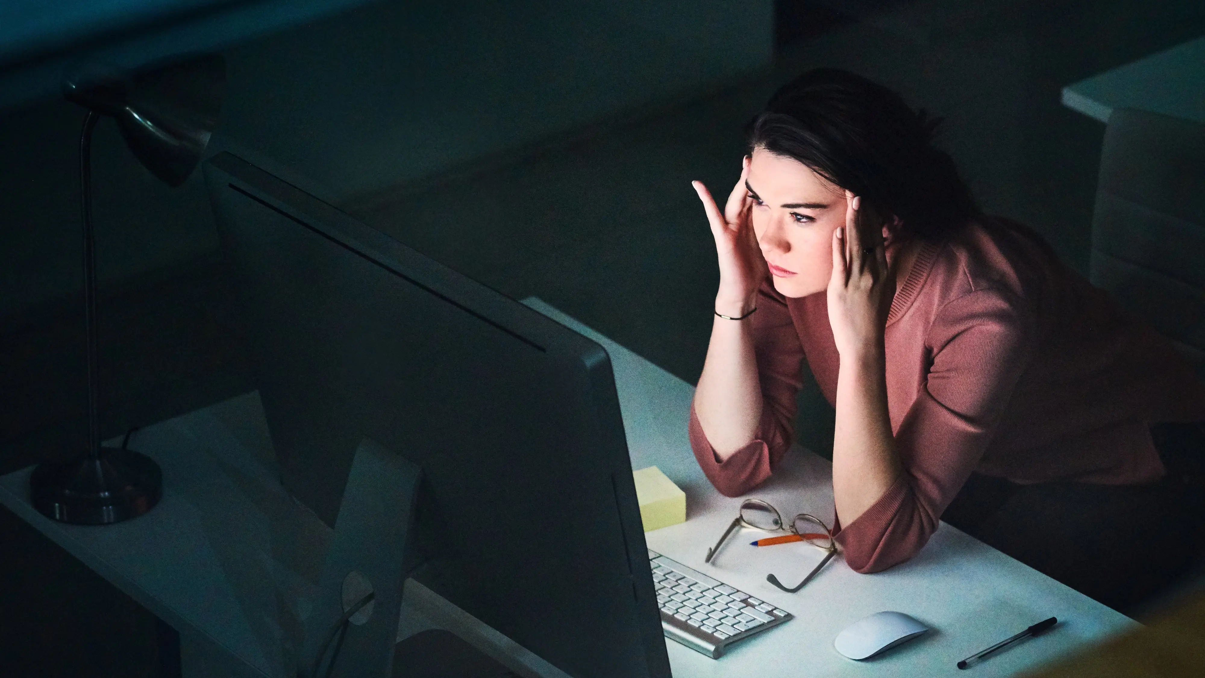 A woman thoughtfully considering her financial options